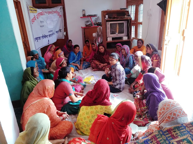 Simran talking to women about new initiatives